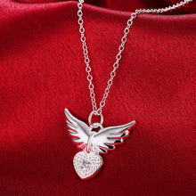 Horseful Heart Angel Pendant